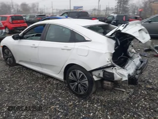 2017 Honda Civic Sedan EX-L with VIN 2HGFC1F74HH648624, listed as a IAAI auction lot 41556540 with 79,147 mi miles. Bid and sale history available at carsss.com. Image 3.