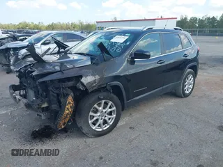 2014 Jeep Cherokee Altitude with VIN 1C4PJMCB5EW146365, listed as a IAAI auction lot 42021350 with 120,652 mi miles and . Bid and sale history available at carsss.com. Image 2.
