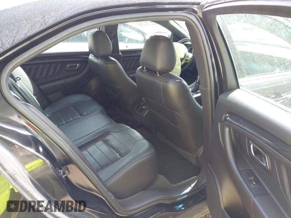 2014 Ford Taurus SHO with VIN 1FAHP2KT8EG131067, listed as a IAAI auction lot 42102086 with 107,822 mi miles. Bid and sale history available at carsss.com. Image 8.