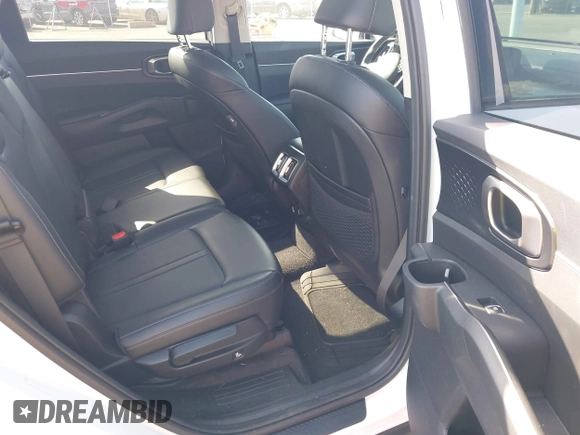 2023 Kia Sorento S with VIN 5XYRL4LC2PG235483, listed as a IAAI auction lot 41304494 with 9,660 mi miles and . Bid and sale history available at DreamBid. Image 8.