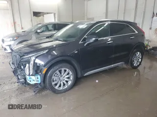 2023 Cadillac XT4 AWD Premium Luxury z VIN 1GYFZDR43PF174188, wystawiony jako Copart lot #59106355 z przebiegiem 27 530 mil mil oraz Szkoda całkowita • Salvage title. Historia ofert i sprzedaży dostępna na DreamBid. Obrazek 1.