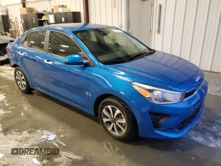 2022 Kia Rio LX with VIN 3KPA24AD3NE497373, listed as a Copart auction lot 84286184 with 27,628 mi miles and Salvage Title. Bid and sale history available at carsss.com. Image 4.