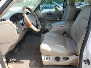 2002 Ford F-150 XLT with VIN 1FTRW08642KD07239, listed as a Copart auction lot 67680504 with 0 mi miles and Salvage Title. Bid and sale history available at carsss.com. Image 7.