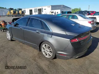 2016 Lincoln MKZ Hybrid with VIN 3LN6L2LU1GR611866, listed as a IAAI auction lot 42112532 with Not provided miles and . Bid and sale history available at DreamBid. Image 3.