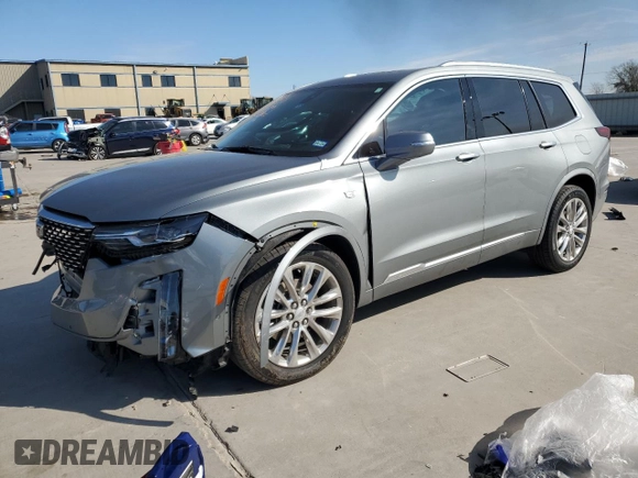 2023 Cadillac XT6 FWD Premium Luxury with VIN 1GYKPCRS4PZ124119, listed as a Copart auction lot 87836515 with 14,752 mi miles and Salvage title. Bid and sale history available at DreamBid. Image 1.