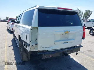 2017 Chevrolet Suburban LT z VIN 1GNSKHKC7HR325641, wystawiony jako IAAI lot #42290768 z przebiegiem 91 802 mil mil oraz . Historia ofert i sprzedaży dostępna na DreamBid. Obrazek 6.