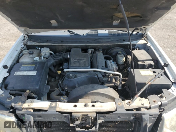 2005 GMC Envoy SLT with VIN 1GKDS13S852261763, listed as a Copart auction lot 75420254 with 182,559 mi miles and Salvage Title. Bid and sale history available at DreamBid. Image 12.
