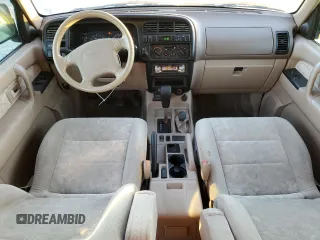 2002 Isuzu Trooper S with VIN JACDJ58X427J08532, listed as a Copart auction lot 84227494 with 166,636 mi miles and Salvage title. Bid and sale history available at DreamBid. Image 8.