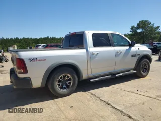 2017 Ram 1500 Rebel z VIN 1C6RR7YT4HS531035, wystawiony jako Copart lot #57652345 z przebiegiem 130 013 mil mil oraz Czysty tytuł • Clean title. Historia ofert i sprzedaży dostępna na DreamBid. Obrazek 3.