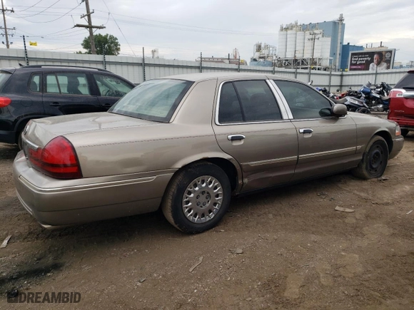 2003 Mercury Grand Marquis GS Convenience with VIN 2MEFM74WX3X680113, listed as a Copart auction lot 65446864 with 167,918 mi miles and Salvage Title. Bid and sale history available at carsss.com. Image 3.