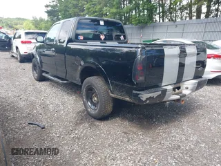 2001 Ford F-150 XLT z VIN 1FTRW08L91KE74815, wystawiony jako IAAI lot #42679387 z przebiegiem 201 258 mil mil oraz . Historia ofert i sprzedaży dostępna na DreamBid. Obrazek 3.
