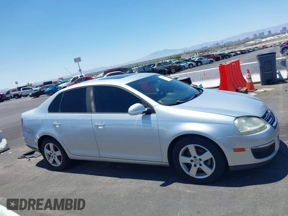 2008 Volkswagen Jetta S with VIN 3VWHM71K58M064797, listed as a IAAI auction lot 42676040 with 211,145 mi miles and . Bid and sale history available at DreamBid. Image 13.