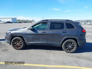 2014 Jeep Cherokee Latitude with VIN 1C4PJMCS3EW298340, listed as a IAAI auction lot 41708488 with 217,438 mi miles and . Bid and sale history available at DreamBid. Image 14.