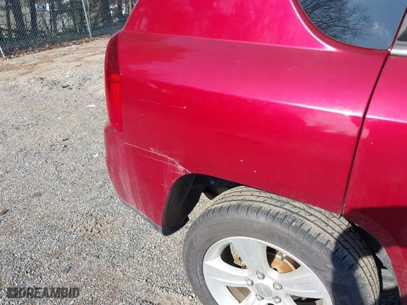 2012 Jeep Compass Latitude with VIN 1C4NJDEB2CD655908, listed as a IAAI auction lot 41768338 with 115,157 mi miles. Bid and sale history available at carsss.com. Image 12.
