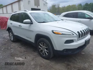 2014 Jeep Cherokee Latitude z VIN 1C4PJMCS6EW169329, wystawiony jako IAAI lot #42270809 z przebiegiem 132 827 mil mil oraz . Historia ofert i sprzedaży dostępna na DreamBid. Obrazek 1.