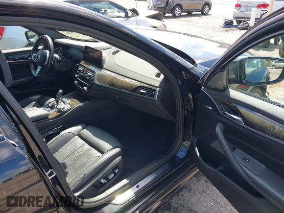 2019 BMW 5 Series M550i xDrive with VIN WBAJB9C51KB289355, listed as a IAAI auction lot 41867984 with 30,106 mi miles and . Bid and sale history available at DreamBid. Image 5.