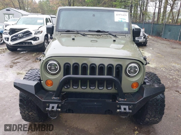 2007 Jeep Wrangler X with VIN 1J4FA24127L231409, listed as a IAAI auction lot 41971429 with 181,855 mi miles and . Bid and sale history available at carsss.com. Image 12.