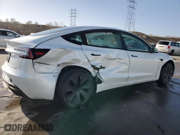2025 Tesla Model 3 Long Range with VIN 5YJ3E1EAXSF935004, listed as a Copart auction lot 52233195 with 5,873 mi miles and Salvage Title. Bid and sale history available at carsss.com. Image 3.
