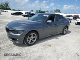 2014 BMW 3 Series 328i with VIN WBA3A5G56ENP33167, listed as a Copart auction lot 61406885 with 125,967 mi miles and Salvage title. Bid and sale history available at DreamBid. Image 1.
