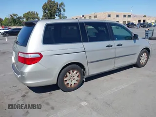 2006 Honda Odyssey LX with VIN 5FNRL38226B085181, listed as a IAAI auction lot 42594621 with 210,616 mi miles and . Bid and sale history available at DreamBid. Image 4.