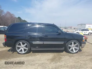 2003 Chevrolet Tahoe LT with VIN 1GNEC13Z73J322783, listed as a IAAI auction lot 41773868 with 259,710 mi miles and . Bid and sale history available at DreamBid. Image 14.