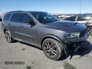 2024 Dodge Durango R/T Plus z VIN 1C4SDJCT6RC199186, wystawiony jako Copart lot #56595055 z przebiegiem 33 973 mil mil oraz Szkoda całkowita • Salvage title. Historia ofert i sprzedaży dostępna na DreamBid. Obrazek 4.