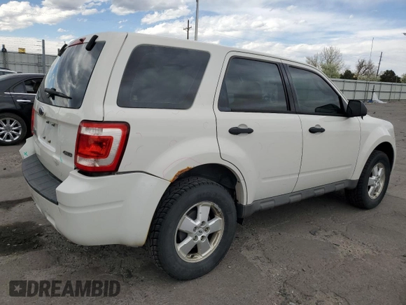 2009 Ford Escape XLS with VIN 1FMCU92749KB31140, listed as a Copart auction lot 53645705 with 213,481 mi miles and Salvage title. Bid and sale history available at DreamBid. Image 3.