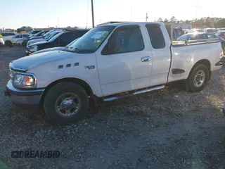 1998 Ford F-150 XL with VIN 1FTZX0724WKA18430, listed as a IAAI auction lot 41220499 with 129,780 mi miles and . Bid and sale history available at DreamBid. Image 2.