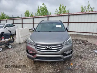 2018 Hyundai Santa Fe 2.4L with VIN 5NMZU3LB1JH100507, listed as a IAAI auction lot 42182116 with 103,826 mi miles and . Bid and sale history available at DreamBid. Image 12.