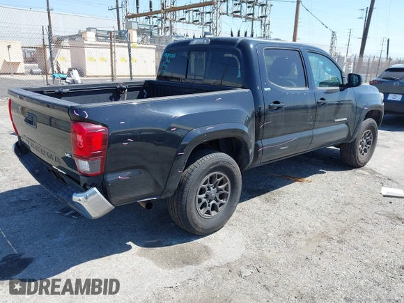 2018 Toyota Tacoma SR5 with VIN 3TMAZ5CN1JM061127, listed as a IAAI auction lot 42012247 with 119,381 mi miles and . Bid and sale history available at DreamBid. Image 4.