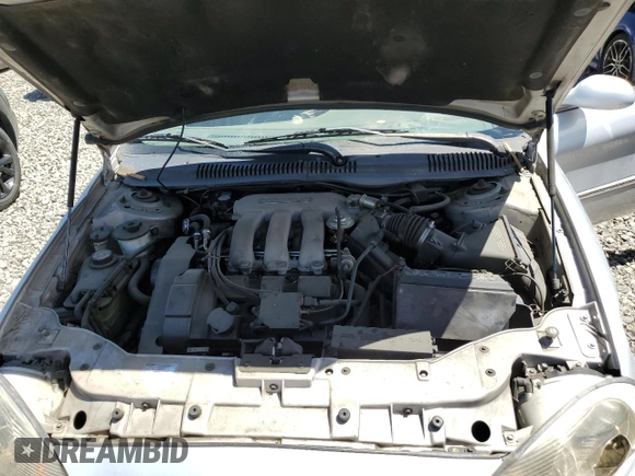 1996 Mercury Sable LS с VIN 1MELM53S4TG634577, выставлен на аукционе Copart как лот 61707733 с пробегом 76 781 миль миль и Списание • Salvage title. История ставок и продаж доступна на DreamBid. Изображение 11.