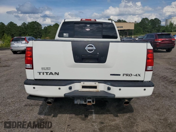 2012 Nissan Titan SV z VIN 1N6BA0EC2CN309207, wystawiony jako Copart lot #60451435 z przebiegiem 124 900 mil mil oraz Szkoda całkowita • Salvage title. Historia ofert i sprzedaży dostępna na DreamBid. Obrazek 6.