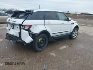 2014 Land Rover Range Rover Evoque Pure Plus z VIN SALVP2BG5EH900420, wystawiony jako IAAI lot #41940049 z przebiegiem 136 916 mil mil oraz . Historia ofert i sprzedaży dostępna na DreamBid. Obrazek 4.