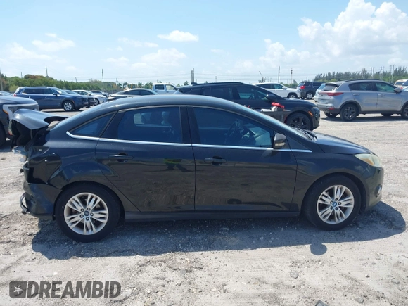 2012 Ford Focus SEL with VIN 1FAHP3H22CL146186, listed as a IAAI auction lot 41977207 with 127,396 mi miles. Bid and sale history available at carsss.com. Image 13.