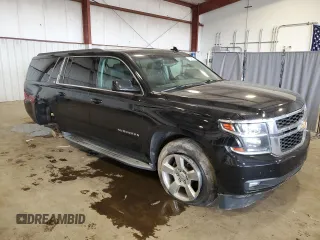 2016 Chevrolet Suburban LT with VIN 1GNSKHKC3GR117500, listed as a Copart auction lot 71548544 with 145,028 mi miles and Salvage Title. Bid and sale history available at DreamBid. Image 4.