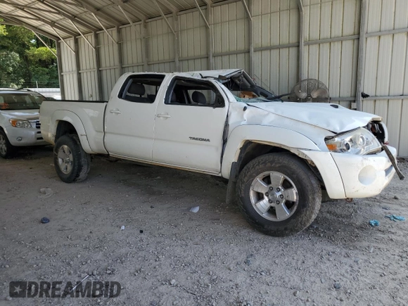 2005 Toyota Tacoma with VIN 3TMMU52N65M001833, listed as a Copart auction lot 62111395 with Not provided miles and Salvage title. Bid and sale history available at DreamBid. Image 4.