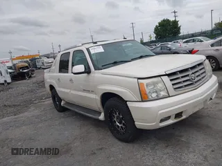 2004 Cadillac Escalade EXT z VIN 3GYEK62N54G138754, wystawiony jako IAAI lot #42297591 z przebiegiem 202 278 mil mil oraz . Historia ofert i sprzedaży dostępna na DreamBid. Obrazek 1.