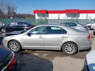 2008 Mercury Milan z VIN 3MEHM07Z58R633485, wystawiony jako IAAI lot #41764314 z przebiegiem 60 842 mil mil oraz . Historia ofert i sprzedaży dostępna na DreamBid. Obrazek 14.