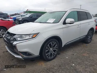 2018 Mitsubishi Outlander SE with VIN JA4AD3A31JZ068236, listed as a IAAI auction lot 40917348 with 144,529 mi miles and . Bid and sale history available at DreamBid. Image 2.