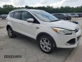 2014 Ford Escape Titanium с VIN 1FMCU0J97EUB15513, выставлен на аукционе Copart как лот 57391715 с пробегом 125 851 миль миль и Списание • Salvage title. История ставок и продаж доступна на DreamBid. Изображение 4.