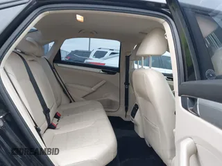 2019 Volkswagen Passat 2.0T Wolfsburg Edition with VIN 1VWLA7A36KC007173, listed as a IAAI auction lot 41357381 with 79,356 mi miles. Bid and sale history available at carsss.com. Image 8.