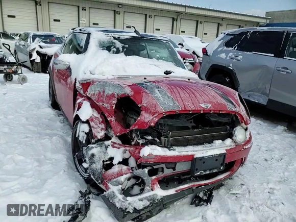 2010 MINI Convertible with VIN WMWMR3C57ATU97979, listed as a Copart auction lot 45903855 with 154,614 mi miles and Salvage Title. Bid and sale history available at DreamBid. Image 10.
