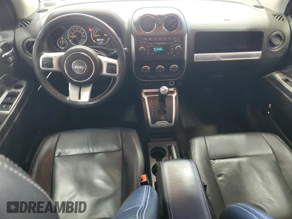 2016 Jeep Compass High Altitude Edition with VIN 1C4NJDEBXGD696289, listed as a Copart auction lot 53302455 with 62,769 mi miles and Salvage Title. Bid and sale history available at carsss.com. Image 8.