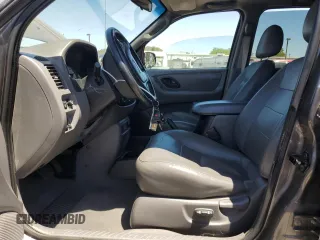 2002 Ford Escape XLT Choice with VIN 1FMYU04182KB99540, listed as a Copart auction lot 61493365 with 156,207 mi miles and Salvage title. Bid and sale history available at DreamBid. Image 7.