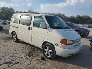 2002 Volkswagen EuroVan с VIN WV2KB47072H018503, выставлен на аукционе Copart как лот 75546724 с пробегом 179 688 миль миль и Списание • Salvage title. История ставок и продаж доступна на DreamBid. Изображение 4.