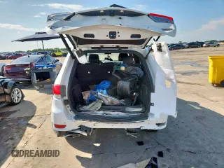2014 Jeep Grand Cherokee Summit with VIN 1C4RJFJG9EC338666, listed as a Copart auction lot 63834075 with 196,840 mi miles and Salvage title. Bid and sale history available at DreamBid. Image 6.