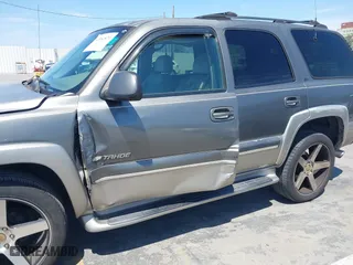 2001 Chevrolet Tahoe LT with VIN 1GNEC13T91R113281, listed as a IAAI auction lot 42081879 with 227,760 mi miles. Bid and sale history available at carsss.com. Image 6.