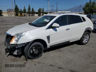 2015 Cadillac SRX Luxury Collection z VIN 3GYFNBE31FS634519, wystawiony jako Copart lot #57292645 z przebiegiem 93 777 mil mil oraz Szkody całkowita. Historia ofert i sprzedaży dostępna na DreamBid. Obrazek 1.