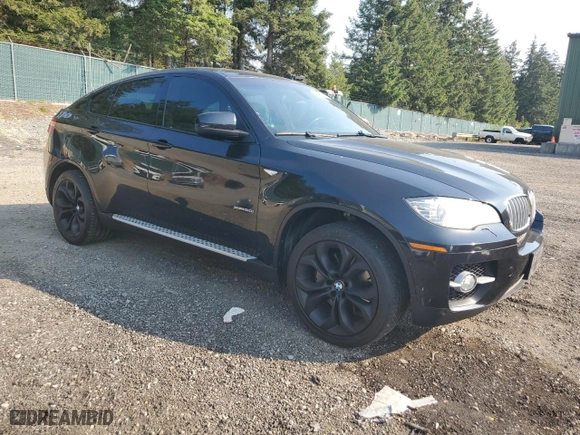 2012 BMW X6 50i with VIN 5UXFG8C56CLZ97342, listed as a Copart auction lot 70263414 with 114,021 mi miles and Clean Title. Bid and sale history available at carsss.com. Image 4.