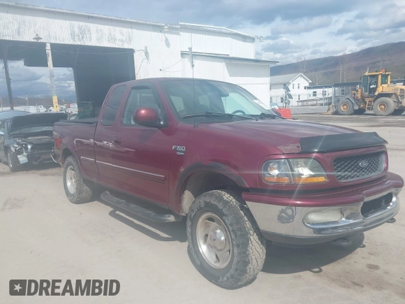 1998 Ford F-150 with VIN 1FTZX18W5WNC39962, listed as a IAAI auction lot 41951328 with 228,438 mi miles and . Bid and sale history available at DreamBid. Image 1.